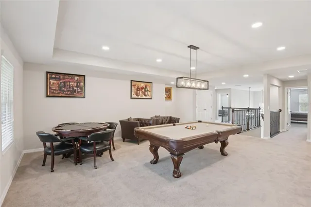 a room with furniture and a chandelier