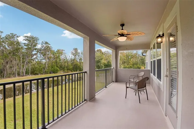 a view of a balcony with furniture