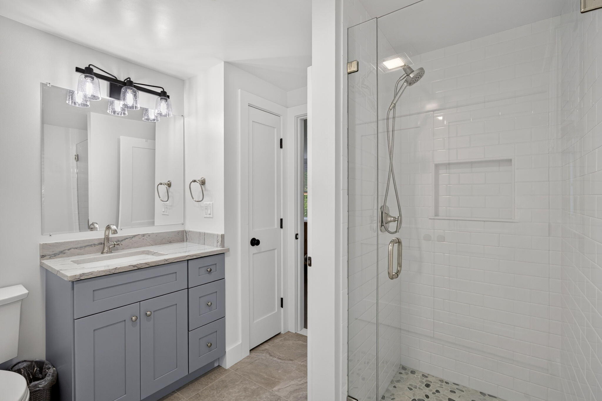 35 Debs Hill Road, Unit 35 Yarmouth Port, MA 02675 - Photo 13 of 36 a bathroom with a granite countertop sink two mirror and shower