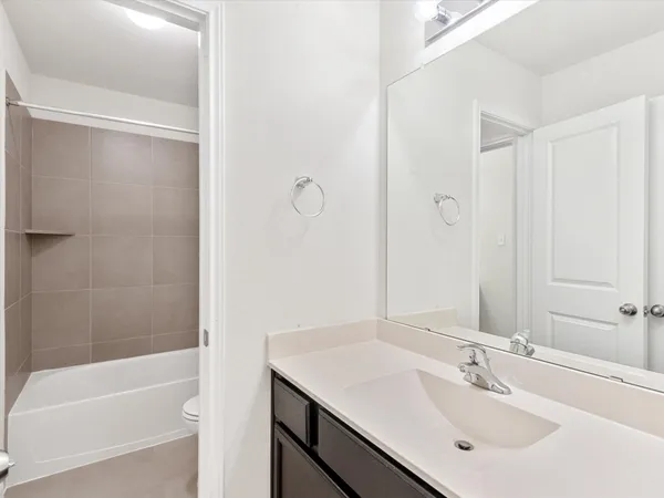 a bathroom with a sink and a bathtub
