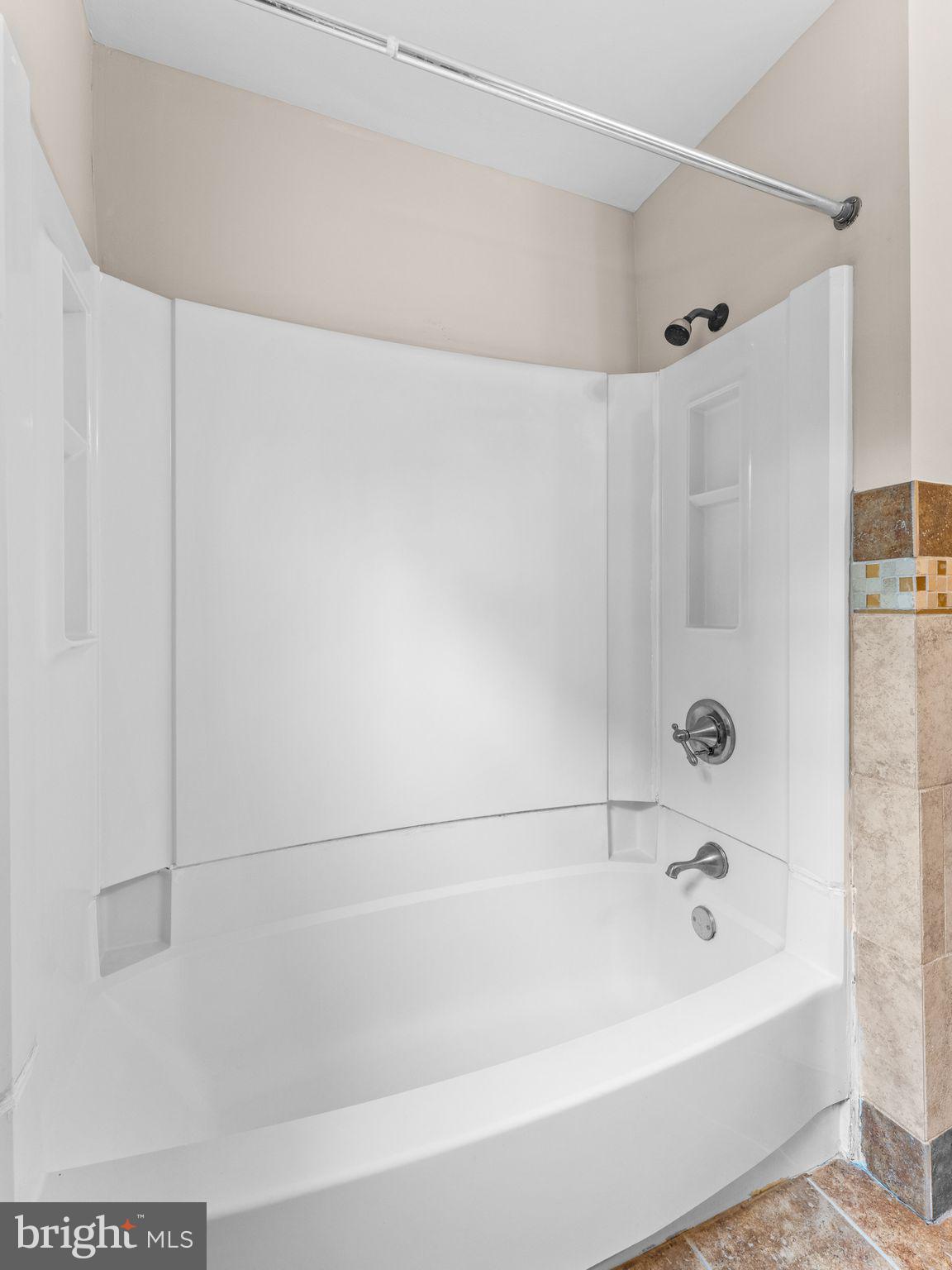 28 Dunham Loop Berlin, NJ 08009 - Photo 16 of 45 a bathroom with a bathtub and a shower