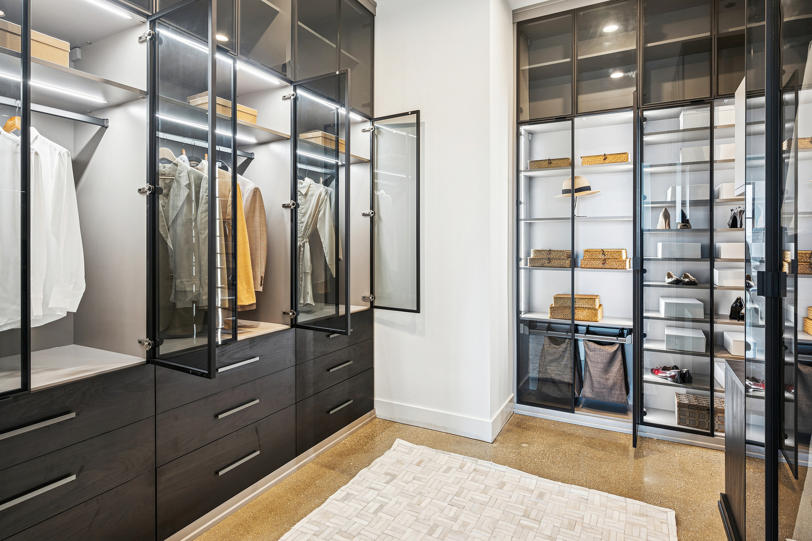 900 West Washington Boulevard, Unit PHW Chicago, IL 60607 - Photo 12 of 30 a view of walk in closet with clothes and shoes