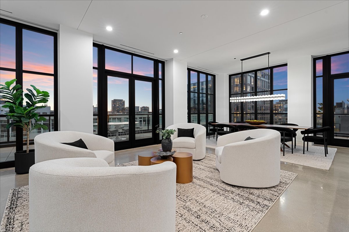900 West Washington Boulevard, Unit PHW Chicago, IL 60607 - Photo 2 of 30 a living room with furniture and a large window