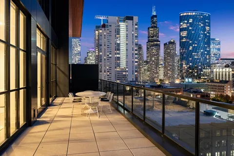 a view of a balcony with city view