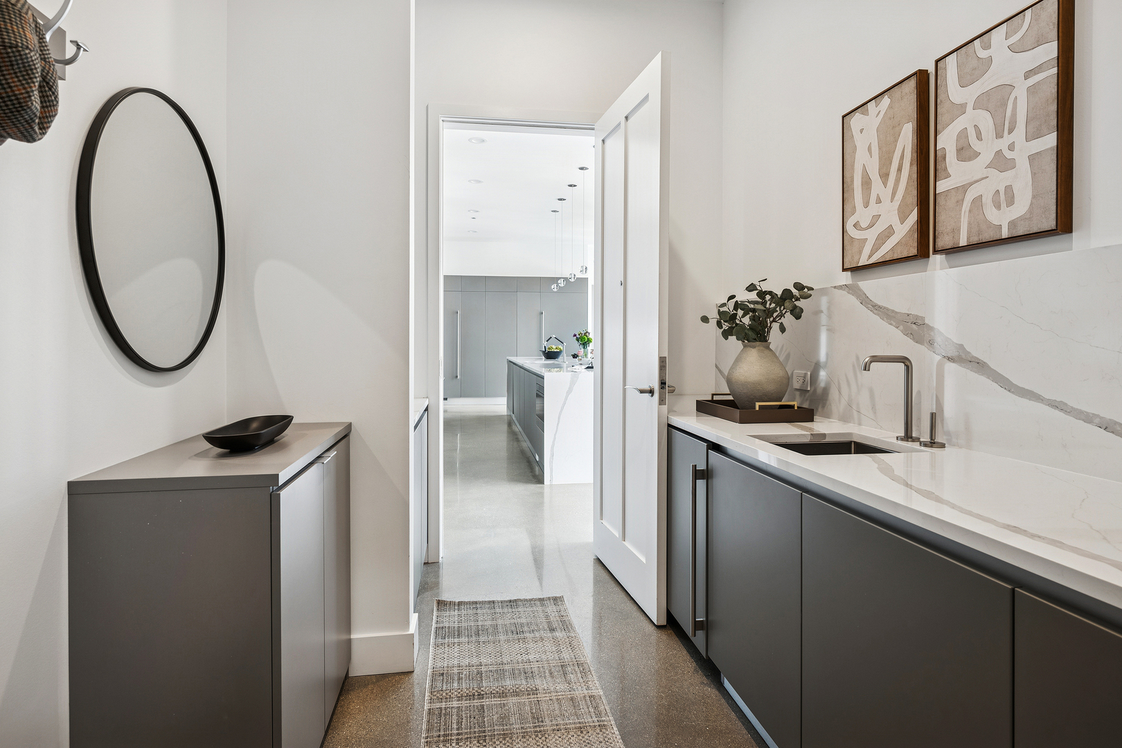 900 West Washington Boulevard, Unit PHW Chicago, IL 60607 - Photo 9 of 30 a kitchen with a refrigerator and a sink