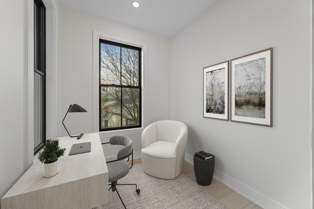 224 West 9th Street, Unit 4 Boston, MA 02127 - Photo 15 of 22 a living room with furniture and a window