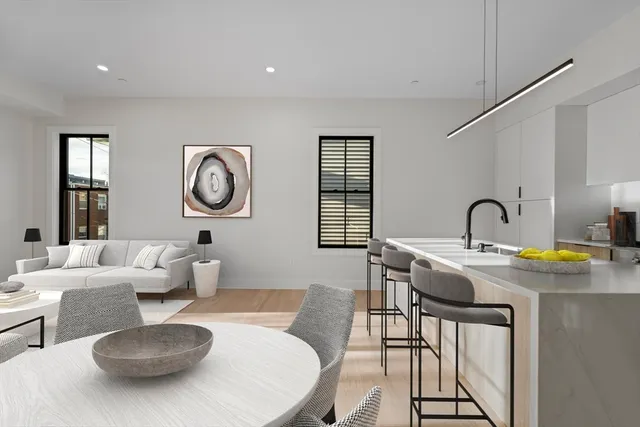 a living room with furniture and window