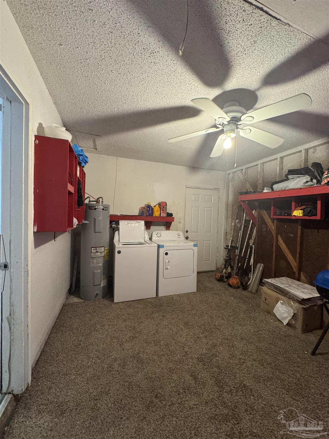 346 Quigley Road Pensacola, FL 32506 - Photo 27 of 28 a storage room with cabinets