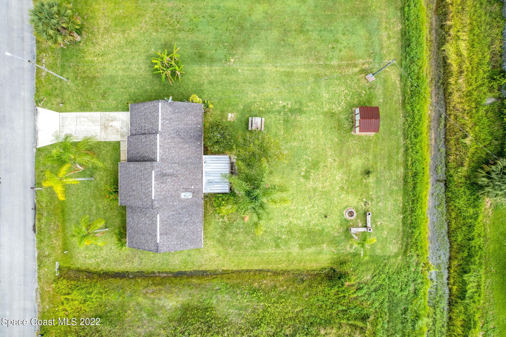 1355 Seabold Road Southwest Palm Bay, FL 32908 - Photo 20 of 22 a view of a garden