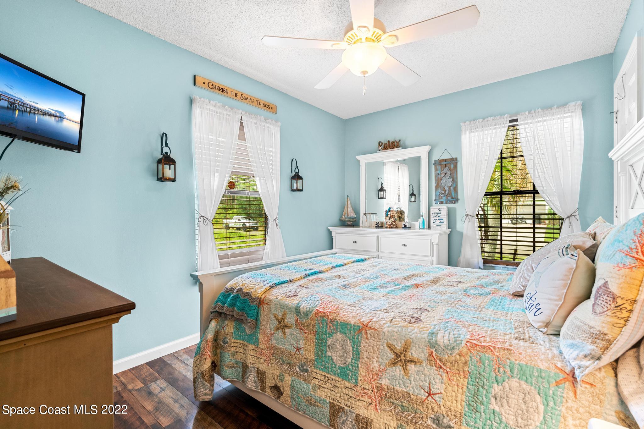 1355 Seabold Road Southwest Palm Bay, FL 32908 - Photo 9 of 22 a bedroom with a bed and a window