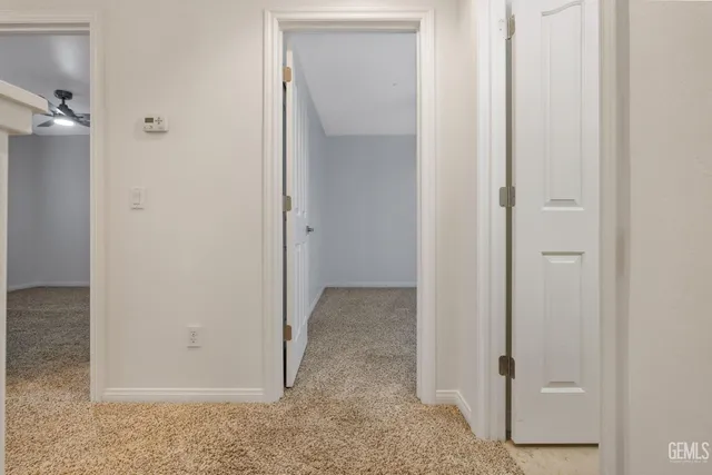 a view of a room with a wardrobe space
