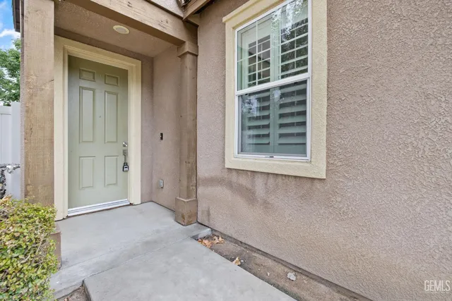 a view of a room that has a window in it