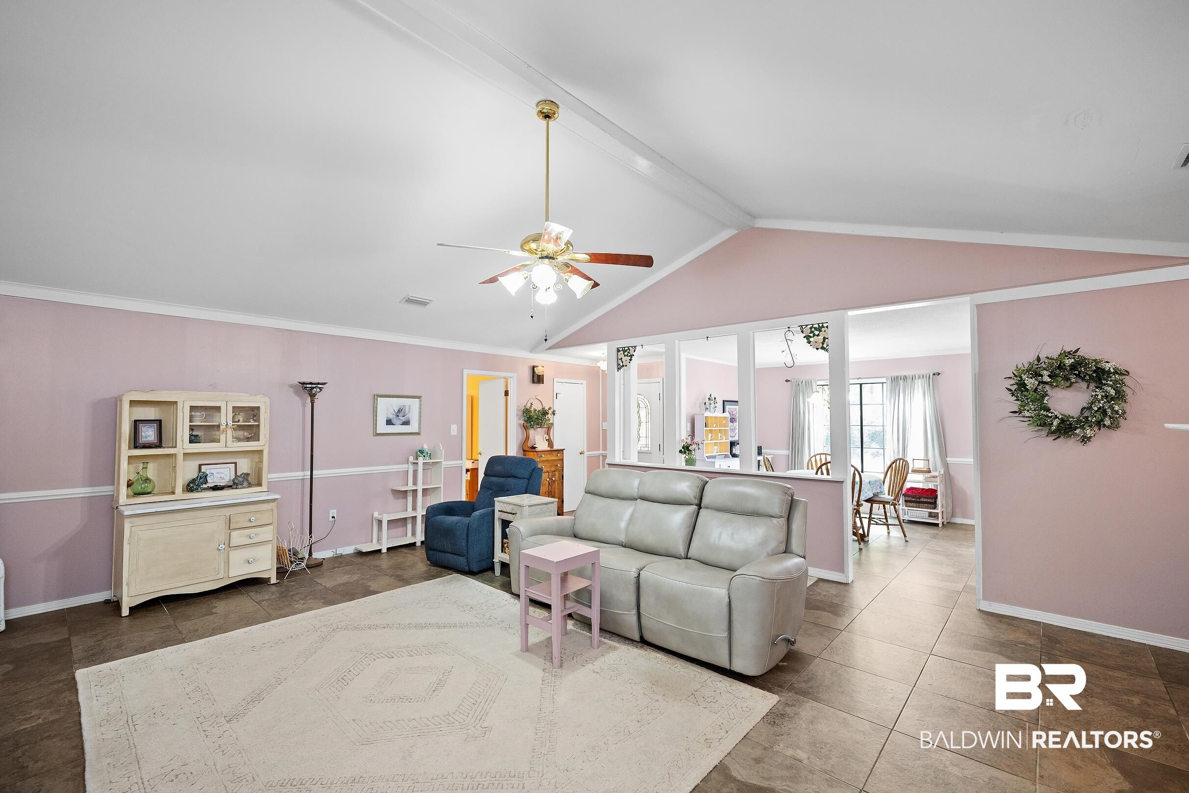 4026 Kingsrow Row Mobile, AL 36619 - Photo 9 of 51 Living room featuring ceiling fan, beam ceiling, and crown molding