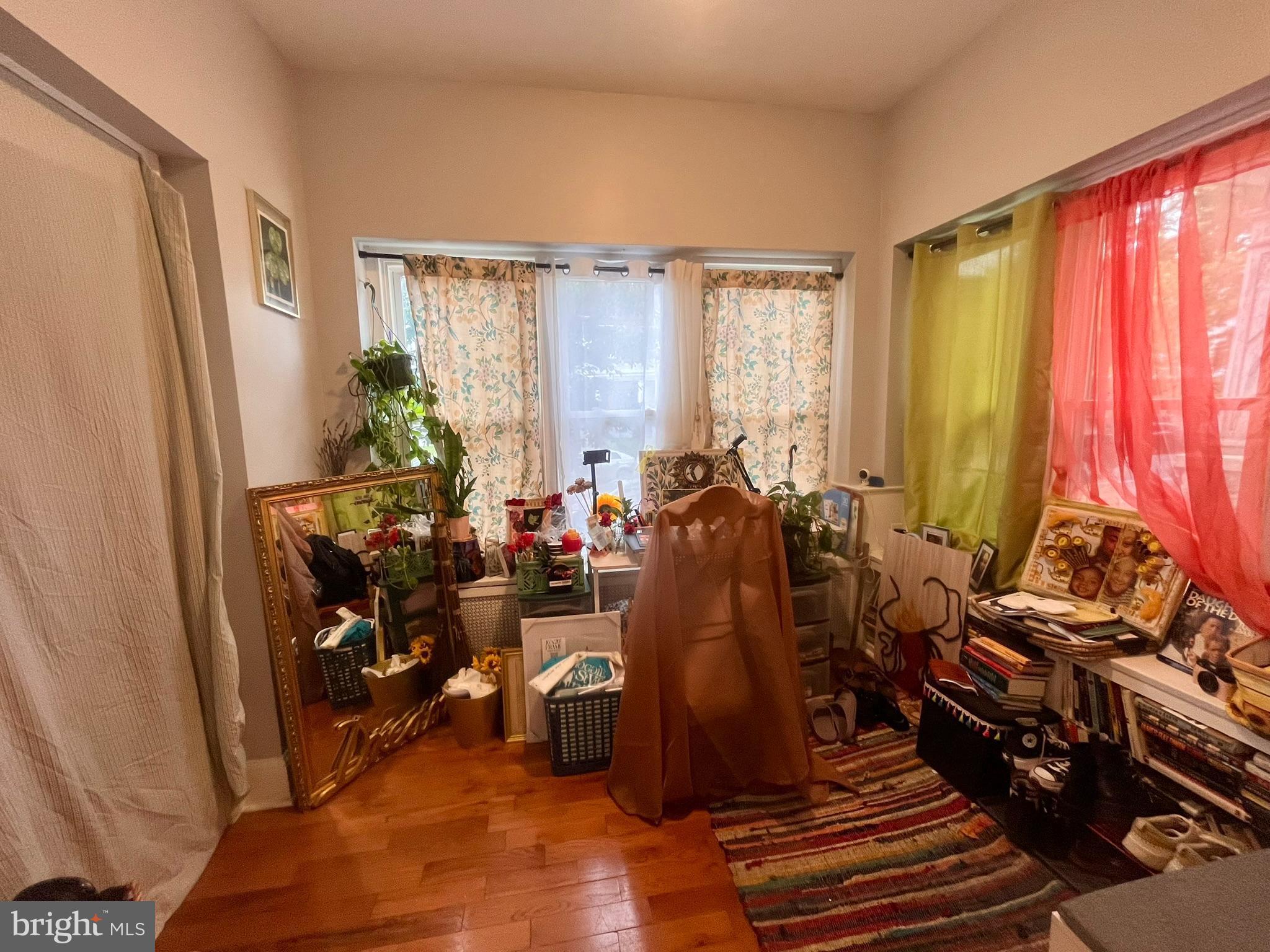 5028 Walnut Street, Unit 1F Philadelphia, PA 19139 - Photo 3 of 32 a room with musical instruments
