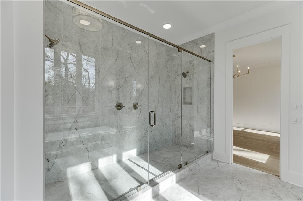 128 Ivey Trace Pendergrass, GA 30567 - Photo 30 of 57 a bathroom with a shower and a toilet
