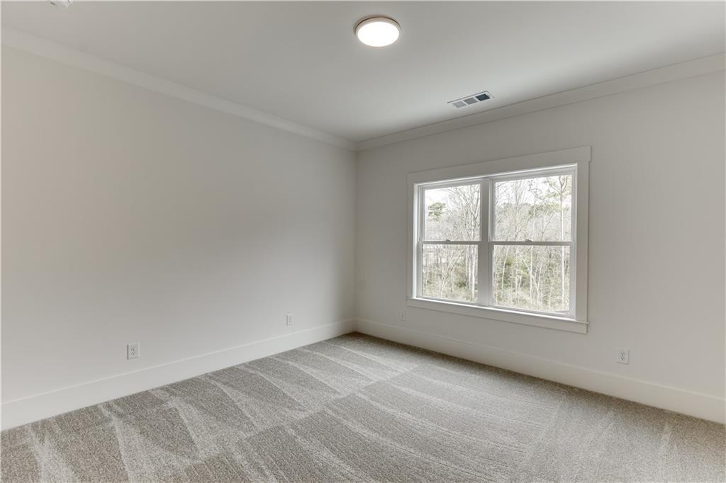 128 Ivey Trace Pendergrass, GA 30567 - Photo 39 of 57 an empty room with a window