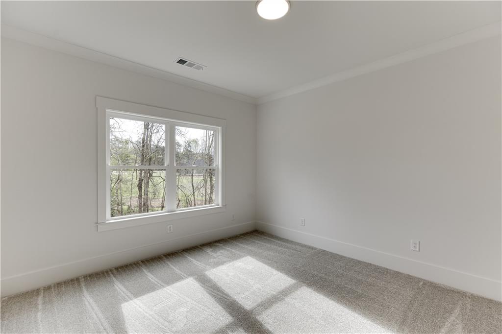 128 Ivey Trace Pendergrass, GA 30567 - Photo 45 of 57 a view of an empty room with a window