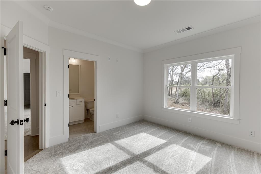 128 Ivey Trace Pendergrass, GA 30567 - Photo 46 of 57 a view of an empty room with a window