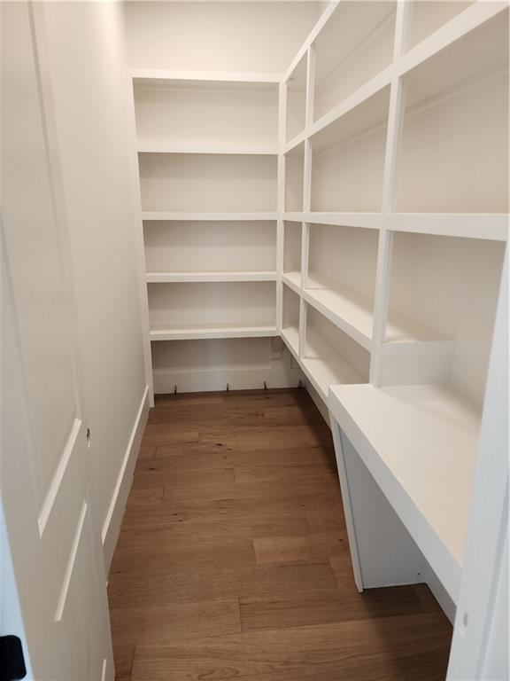 128 Ivey Trace Pendergrass, GA 30567 - Photo 6 of 57 a storage room with empty racks