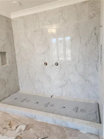a view of a bathroom with shower