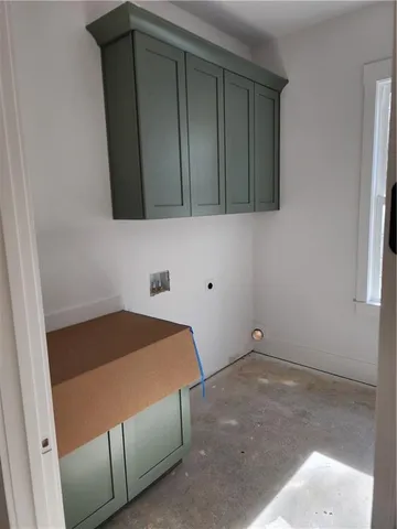 a bedroom with a bed and cabinets