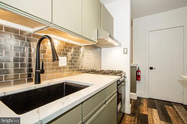 a bathroom with a sink and a bathtub