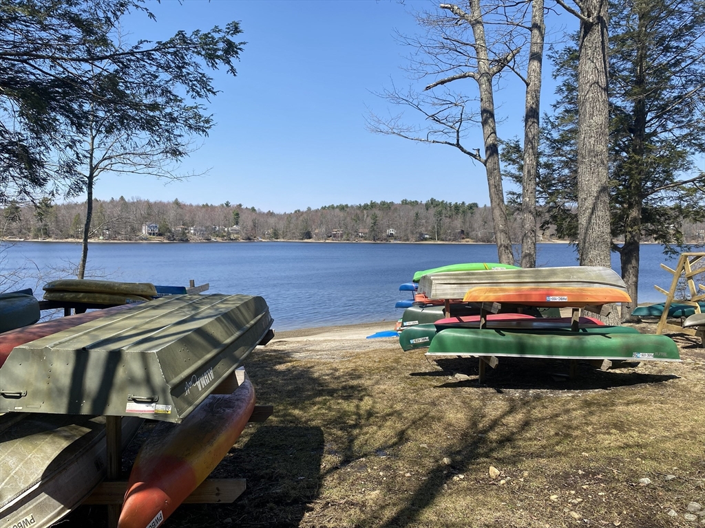 Lot 43 South Village Road Tolland, MA 01034 - Photo 4 of 7 a view of a lake with a swimming pool and a lake view