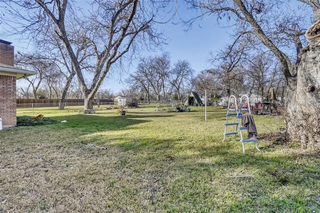 a garden view with a sitting space