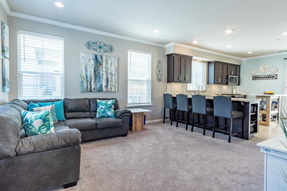 112 Springtime Circle Hollister, CA 95023 - Photo 12 of 63 a living room with furniture and a window