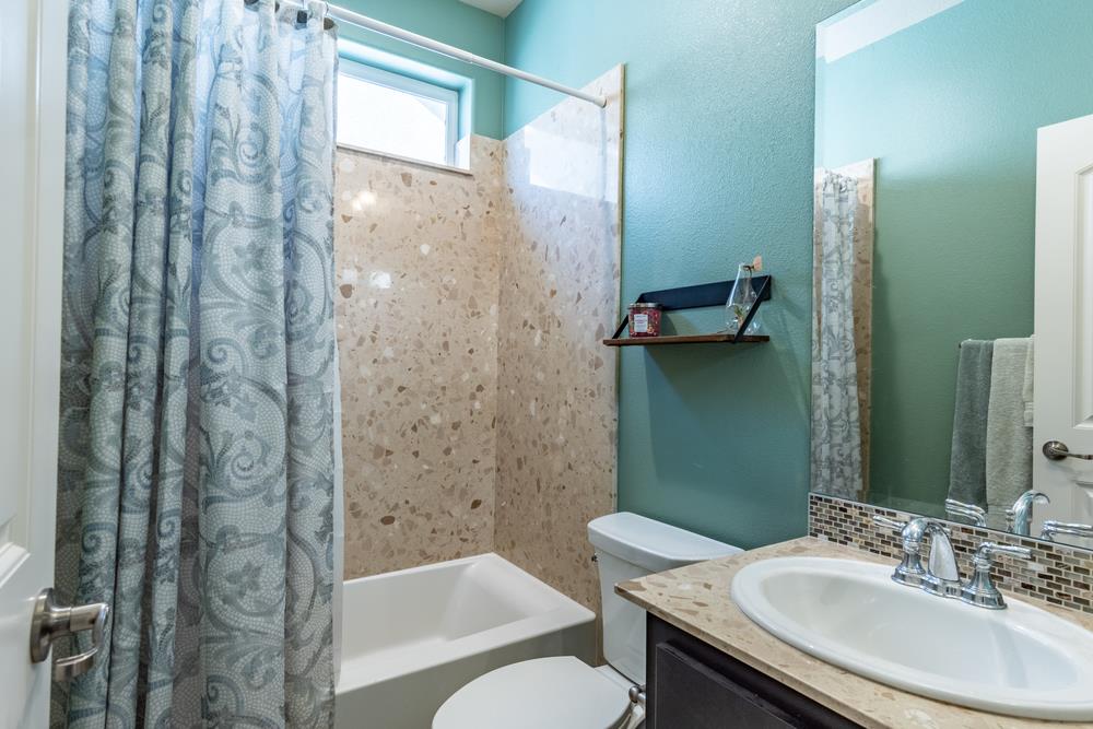 112 Springtime Circle Hollister, CA 95023 - Photo 31 of 63 a bathroom with a sink toilet and shower