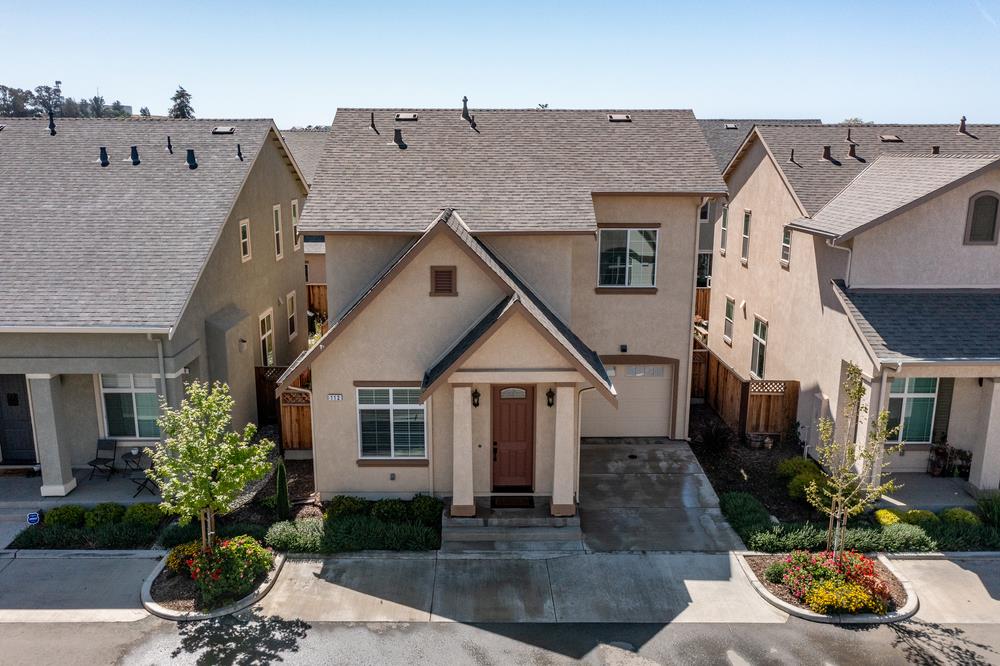 112 Springtime Circle Hollister, CA 95023 - Photo 50 of 63 a front view of a house with a yard and outdoor seating