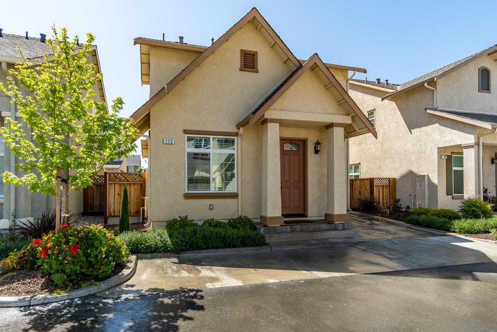 112 Springtime Circle Hollister, CA 95023 - Photo 10 of 63 a front view of a house with a yard