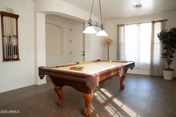 a table and chairs in a room