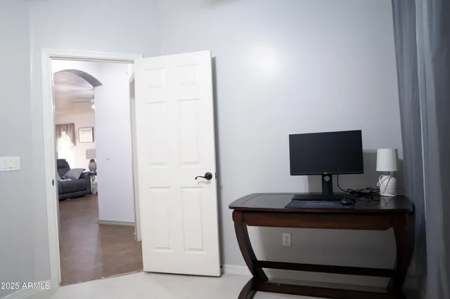 a living room with a couch and a flat screen tv