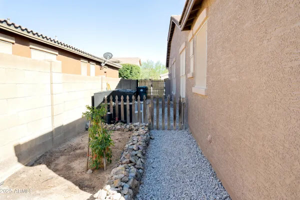 a view of a house with a small yard