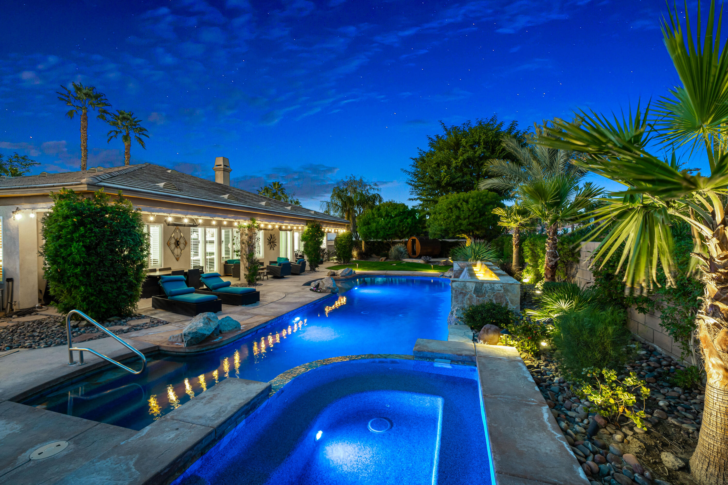 49474 Jordan Street Indio, CA 92201 - Photo 2 of 51 a view of a house with swimming pool and sitting area