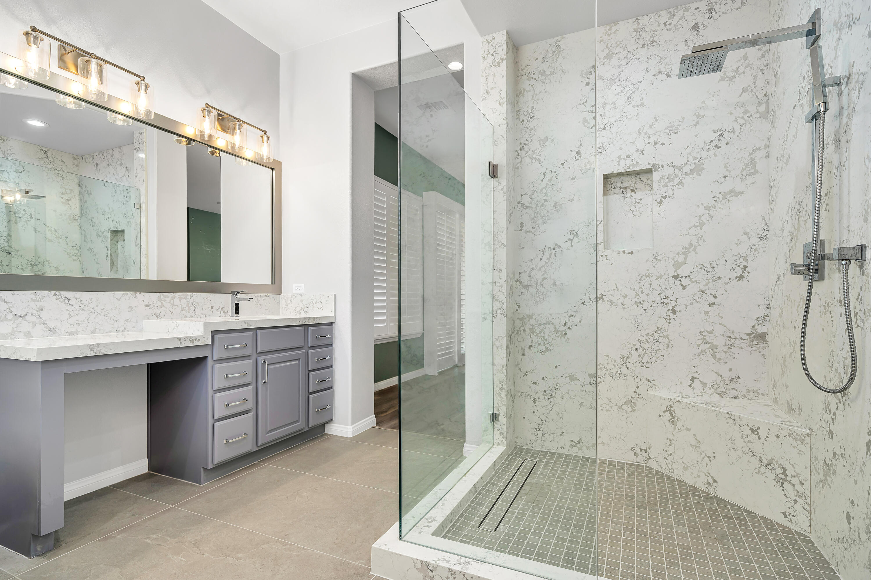 49474 Jordan Street Indio, CA 92201 - Photo 23 of 51 a bathroom with a sink a toilet and shower