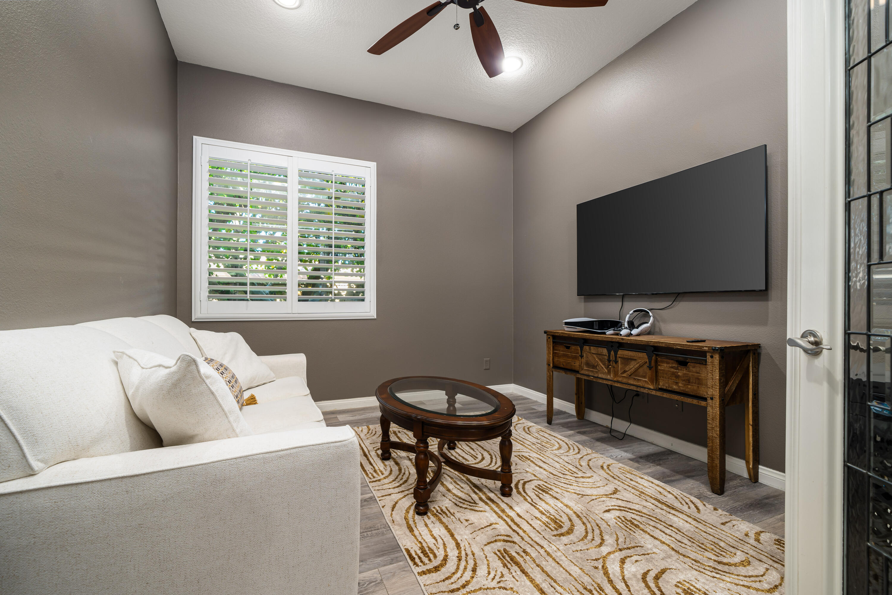 49474 Jordan Street Indio, CA 92201 - Photo 24 of 51 a living room with furniture and a flat screen tv