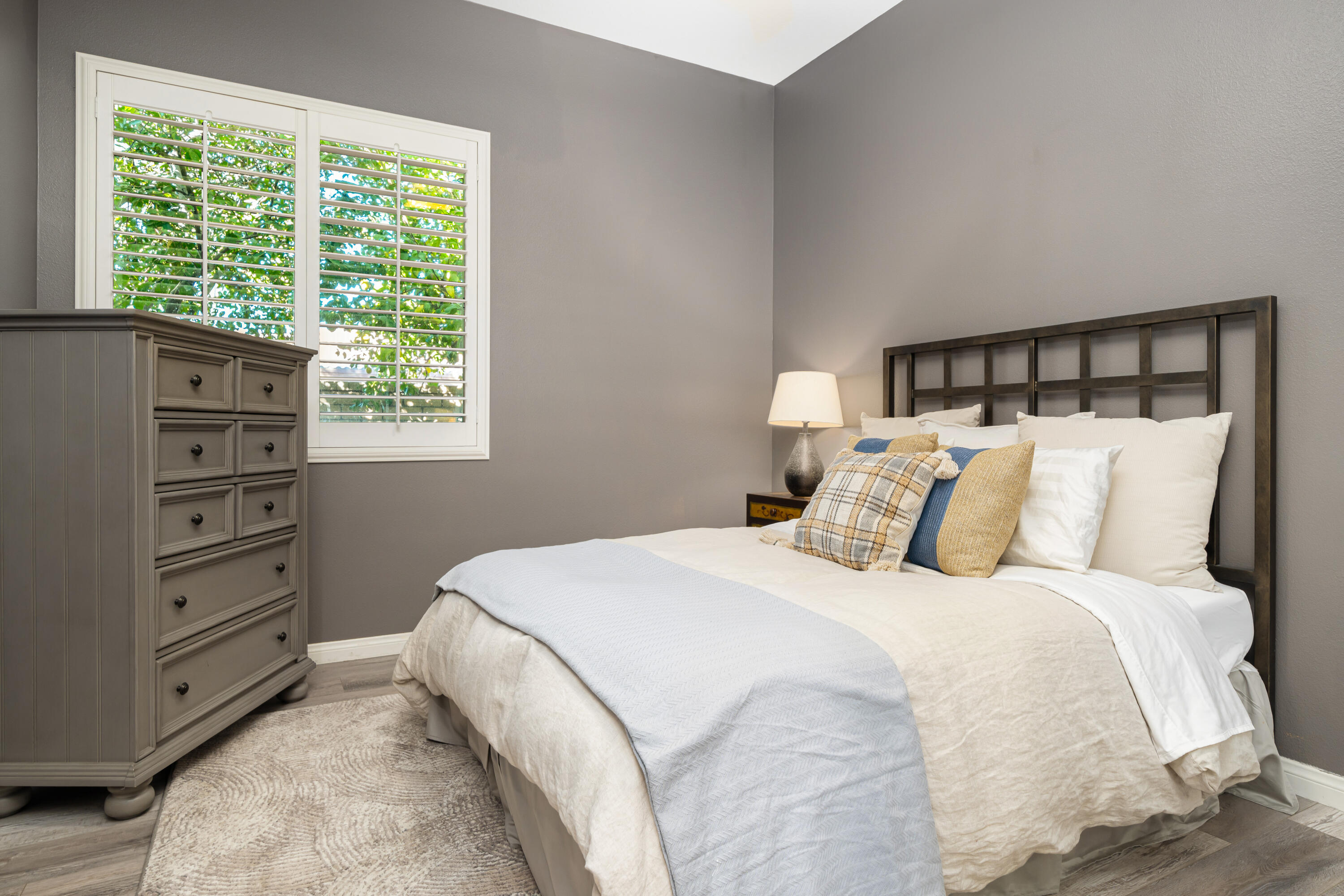 49474 Jordan Street Indio, CA 92201 - Photo 26 of 51 a bedroom with a bed and a window