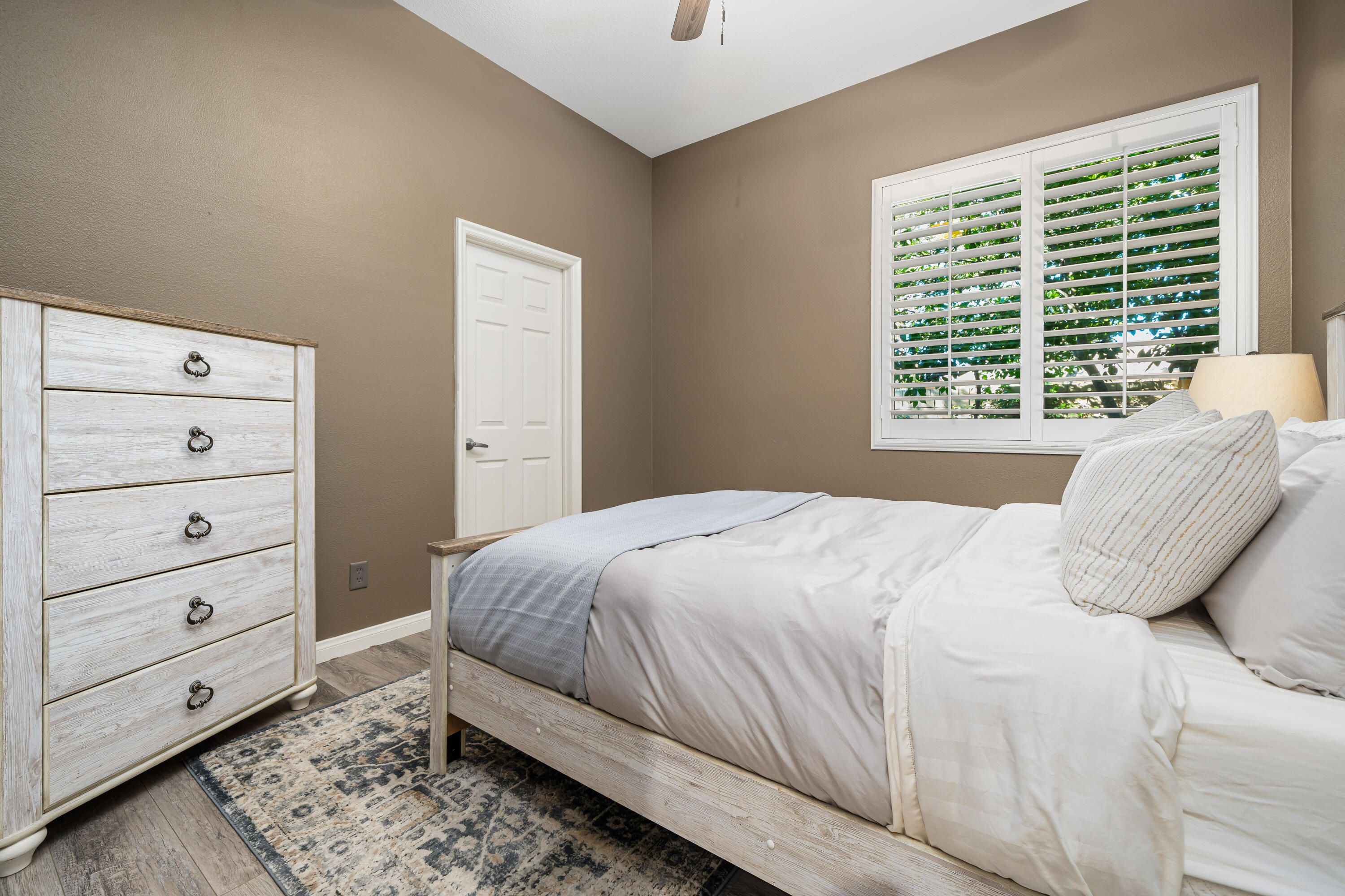 49474 Jordan Street Indio, CA 92201 - Photo 28 of 51 a bedroom with a bed and a window