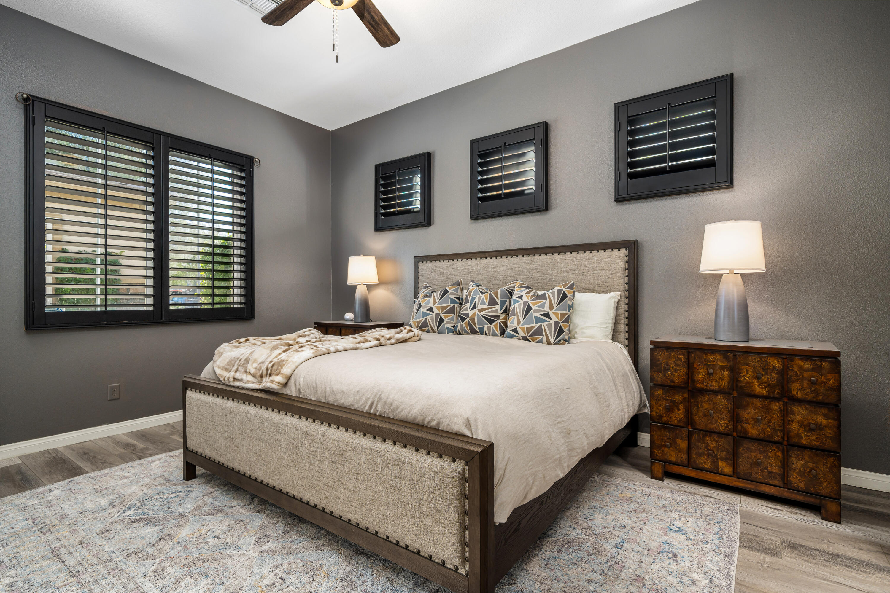 49474 Jordan Street Indio, CA 92201 - Photo 30 of 51 a bedroom with a bed and lamp