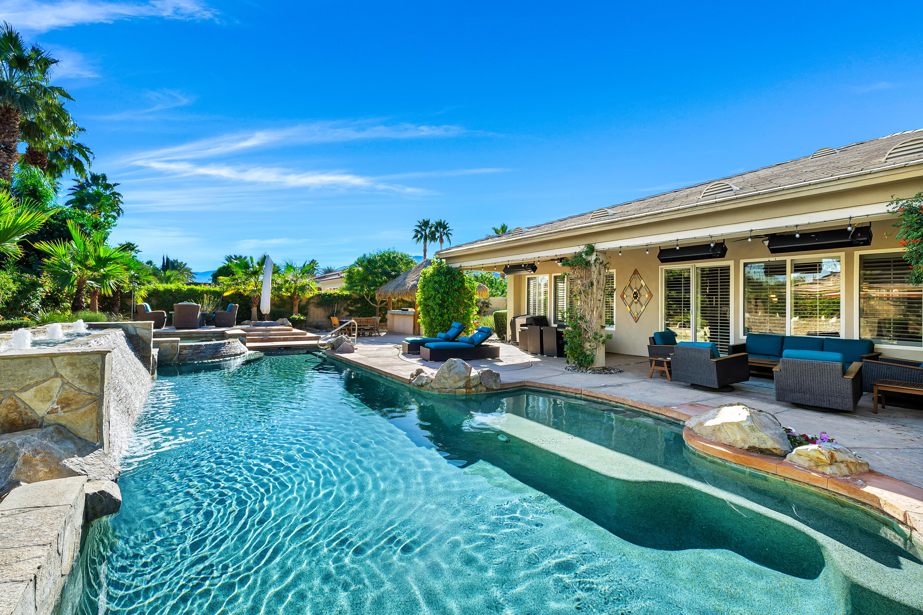 49474 Jordan Street Indio, CA 92201 - Photo 42 of 51 a view of a house with swimming pool and porch