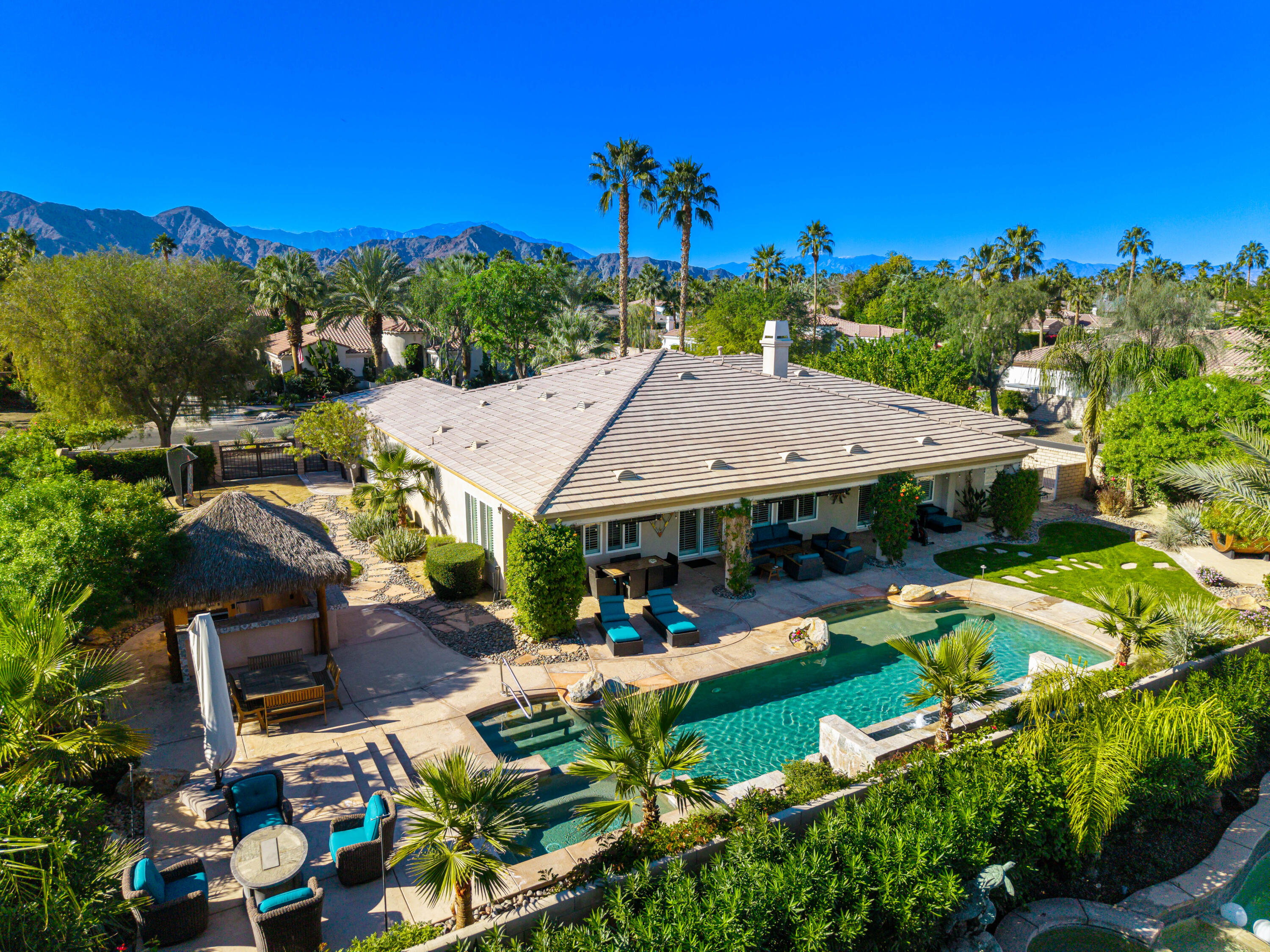 49474 Jordan Street Indio, CA 92201 - Photo 49 of 51 an outdoor space with seating area and hardwood
