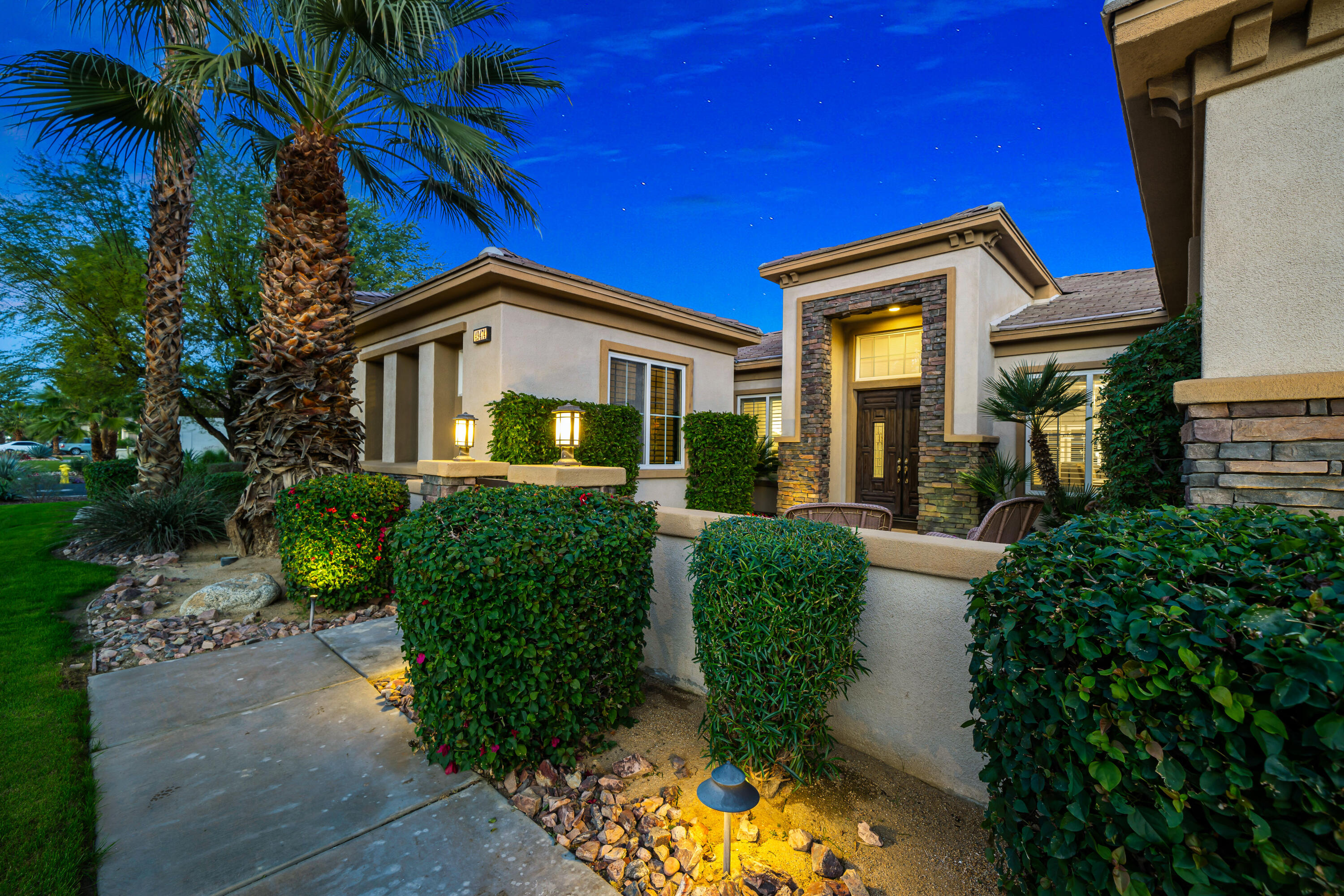 49474 Jordan Street Indio, CA 92201 - Photo 6 of 51 a front view of a house with a yard