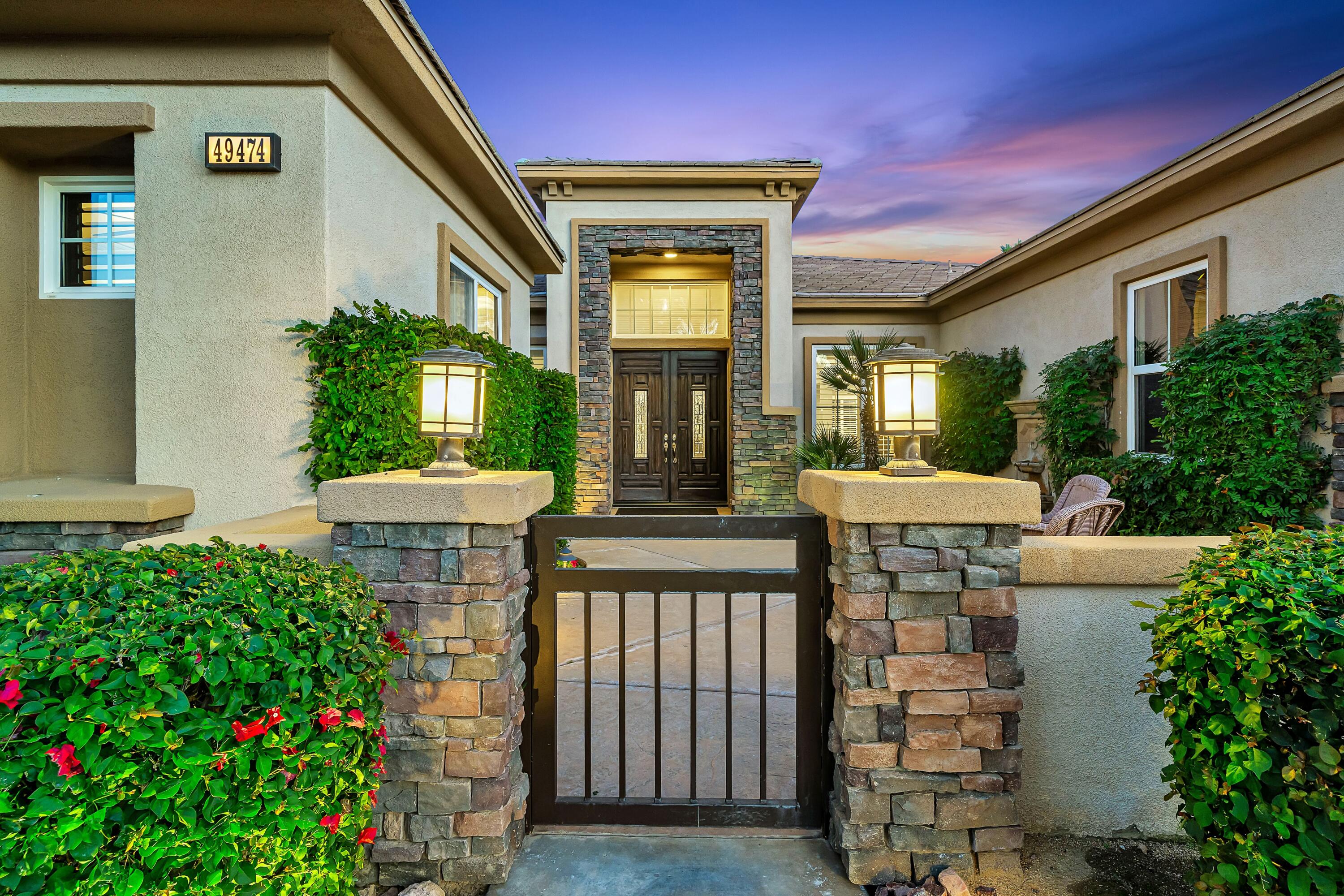 49474 Jordan Street Indio, CA 92201 - Photo 7 of 51 a living room filled with furniture and a potted plant