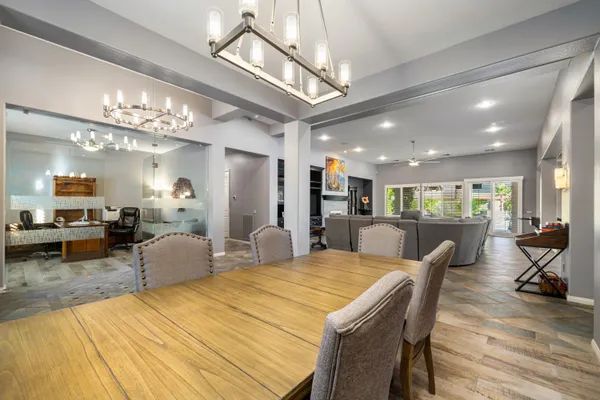 an outdoor space with seating area and hardwood