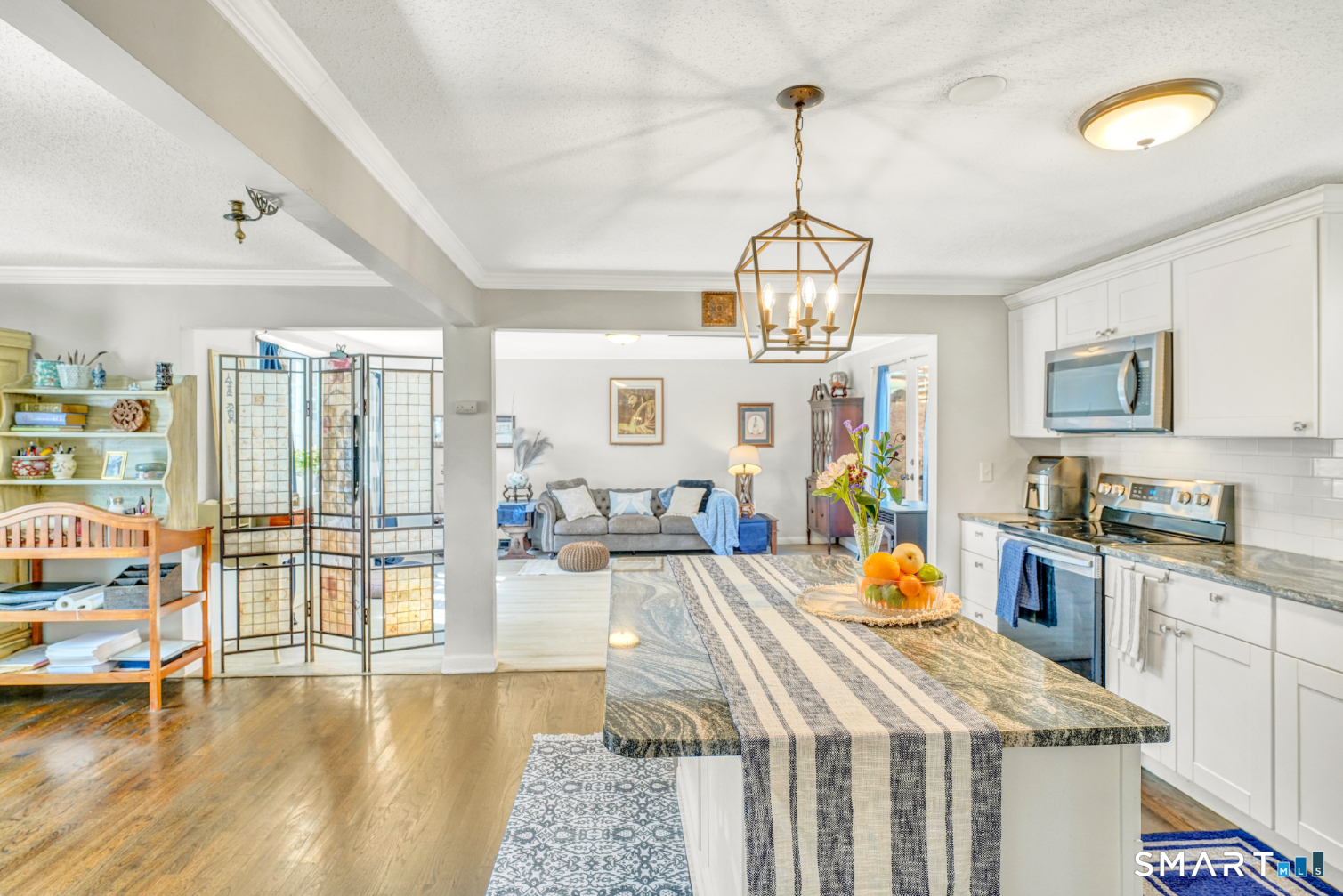 140 Devonwood Drive Waterbury, CT 06708 - Photo 4 of 13 a view of a living room and dining room