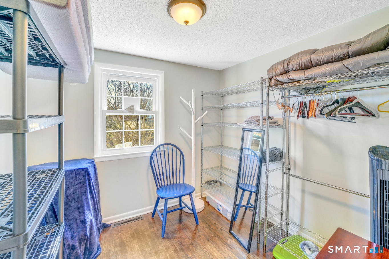 140 Devonwood Drive Waterbury, CT 06708 - Photo 10 of 13 a view of a livingroom with furniture and a window