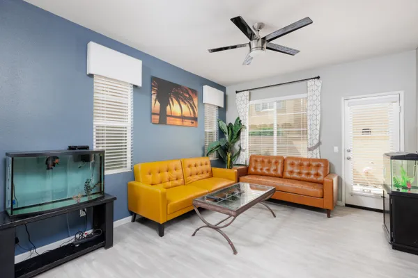 a living room with furniture and a window