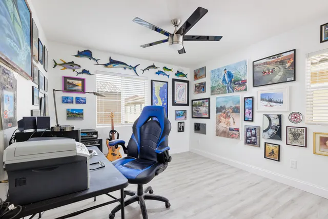 a living room with furniture a rug and a window
